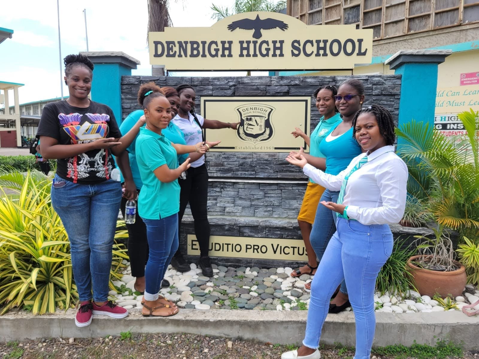 Members of the Denbigh community gathered at the Denbigh High School entrance